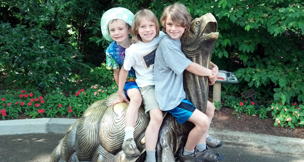 The Three Big Kids Riding a Giant Turtle