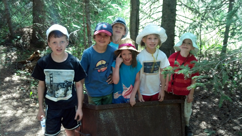 The Kids in an Old Mine Cart