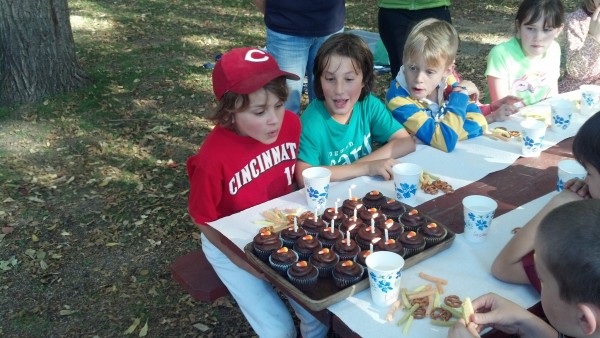 Andrew Blowing Out His Candles