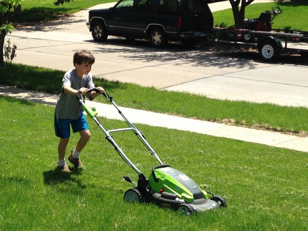 Andrew Mowing the Lawn