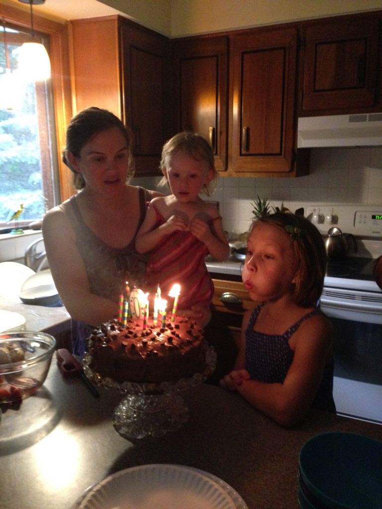 Mari blowing out her candles